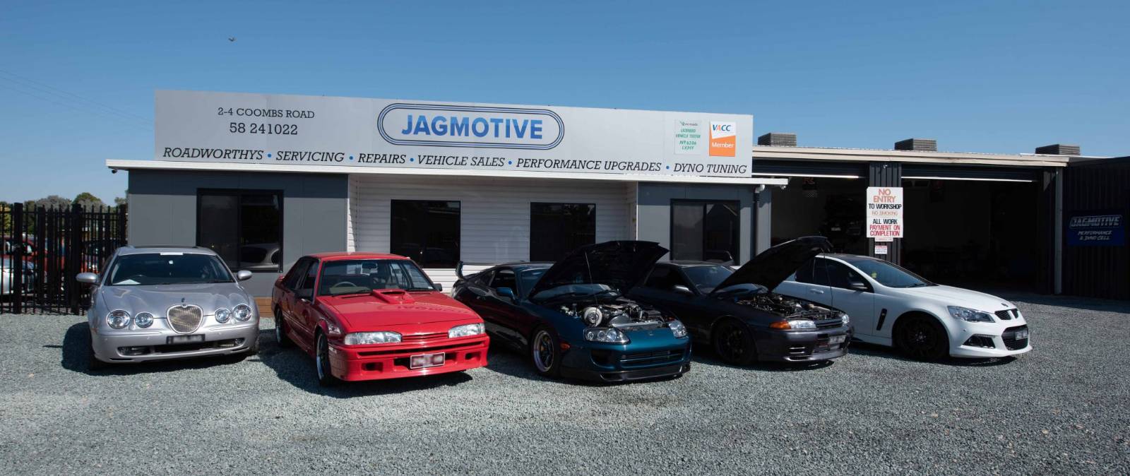 The Jagmotive workshop on Coombs Road, Tatura, with cars parked out front